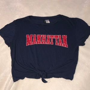 Navy blue shirt w/ Red Manhattan writing tie Crop